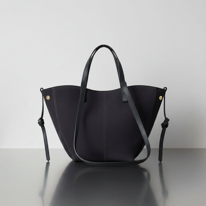 Navy Suede Tote Bag in a studio