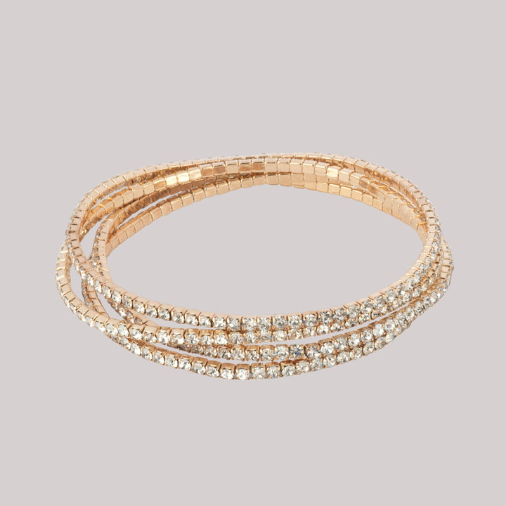 Set of four gold stretch tennis bracelets set with CZ stones