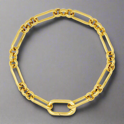 The Monika Gold Chain Bracelet features a piaf design and large clasp