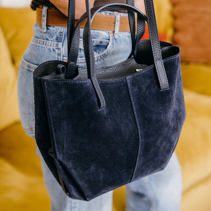 Navy Suede Tote Bag showing strap extension