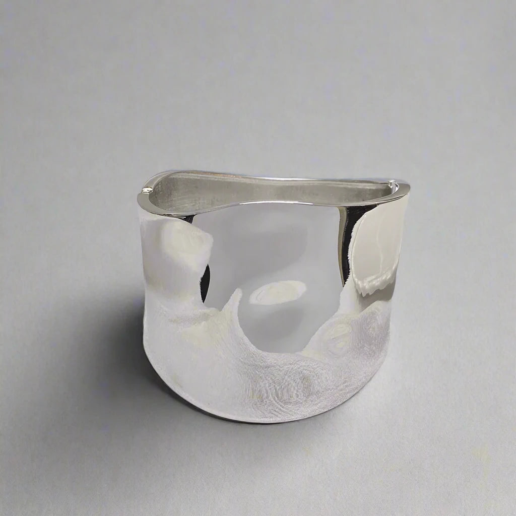Wanda statement wide hinged cuff bracelet. Polished silver.