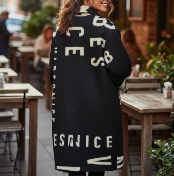 Taggie Graphic Print Overcoat in Black | One Size