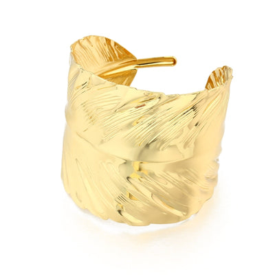 The beautiful Serena cuff bracelet curves around your wrist in the shape of a leaf. This 8cm wide statement piece is crafted from durable zinc alloy with gold plate.  Gently adjustable.