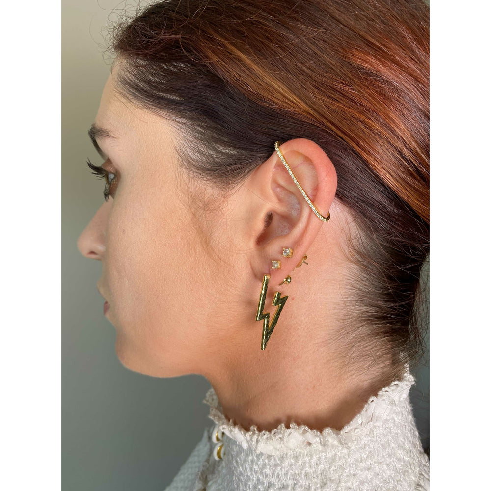 From LA based celebrity jewellery designer MELINDA MARIA, these lightning bolt hoops are as edgy as they are beautiful. Gold