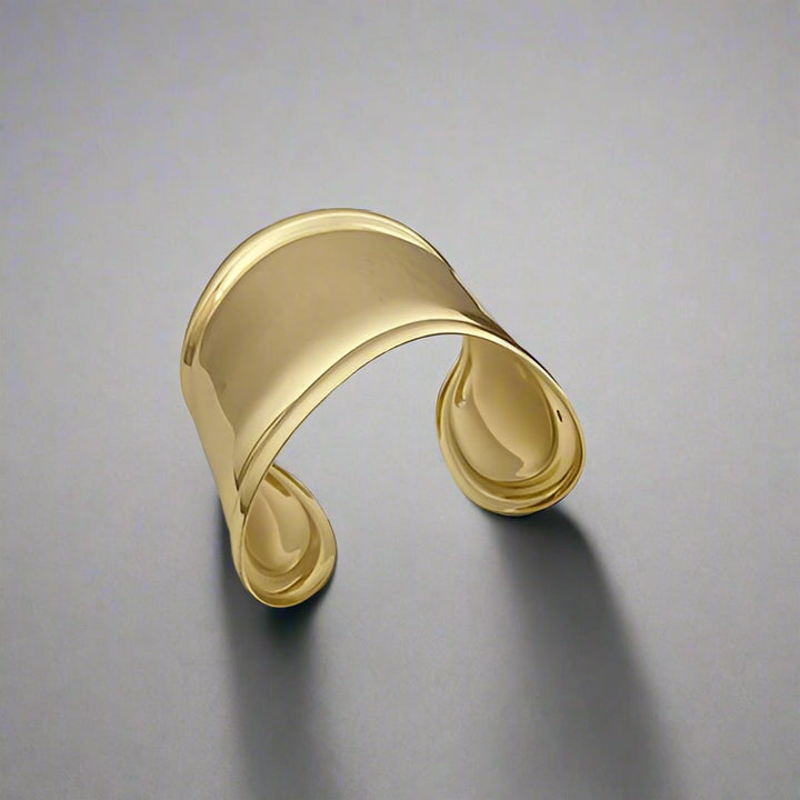 This beautiful Osso Bone Style Cuff in Gold is a tribute to a famous designer piece.