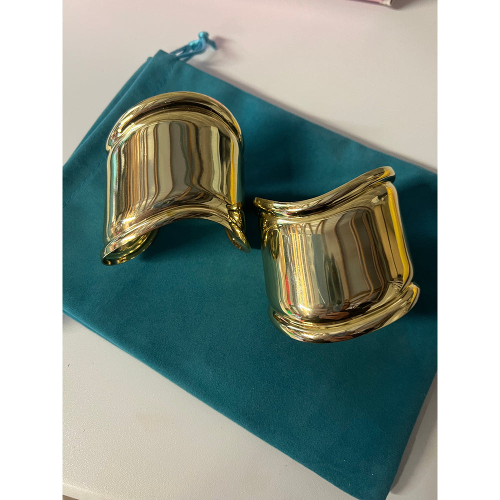 This beautiful Osso Bone Style Cuff in Gold is a tribute to a famous designer piece.