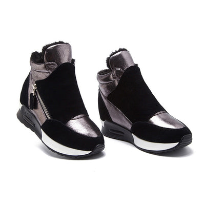 Sheldrake is a futuristic style sneaker boot with a platform sole. Choose basic style or black faux fur lined version. This model features a zip fasterner and contrast panels of pewter metallic and black faux suede. Heel height 3cm. US sizes, please see conversion table.