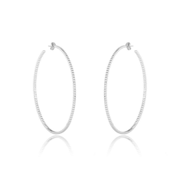 Melinda Maria 3" Warrior Hoop Earrings in Silver.&amp;nbsp;